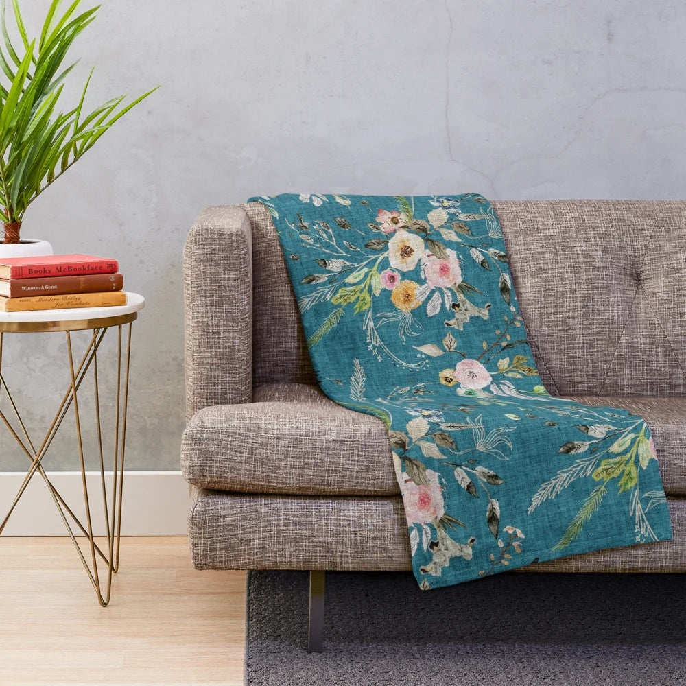Teal floral plush blanket with romantic, bohemian-inspired design