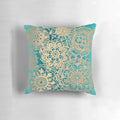 Teal green and gold mandala pattern decorative pillow with a bohemian, modern design.