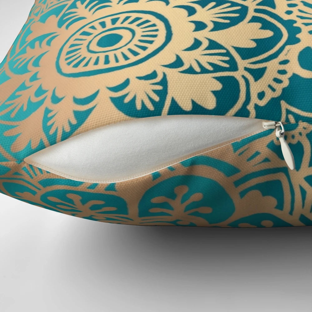Teal green and gold mandala pattern decorative pillow with a bohemian, modern design.