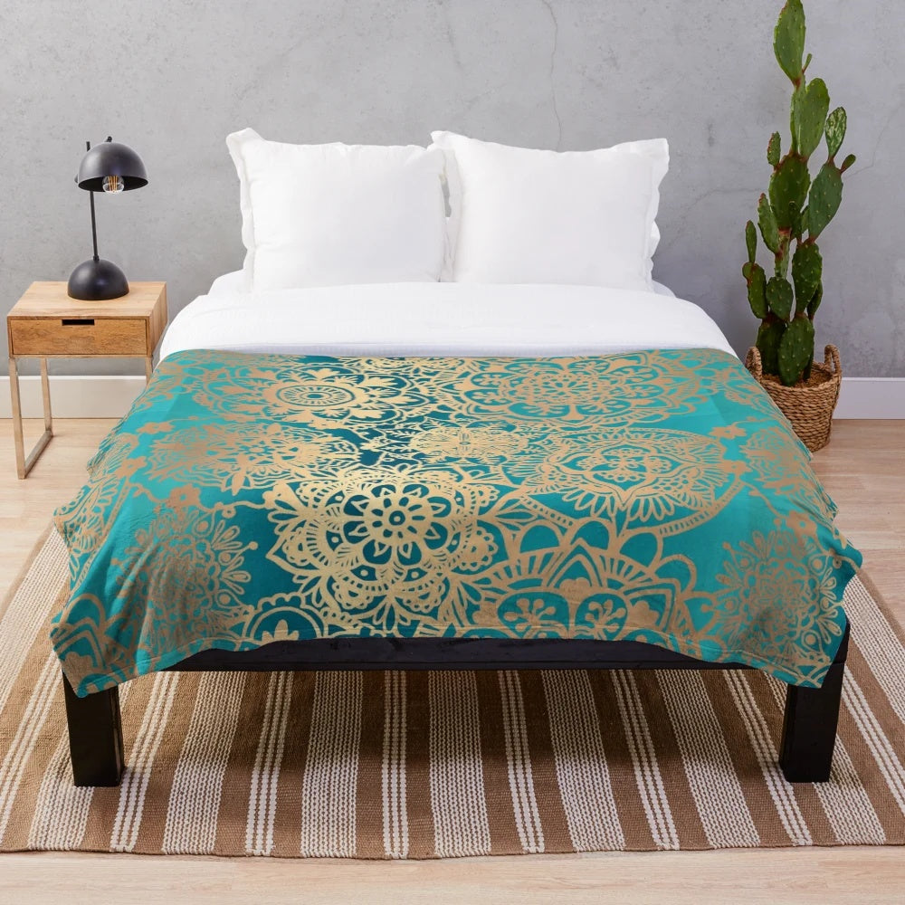 Teal green and gold mandala pattern plush blanket