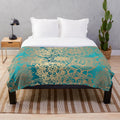 Teal green and gold mandala pattern plush blanket