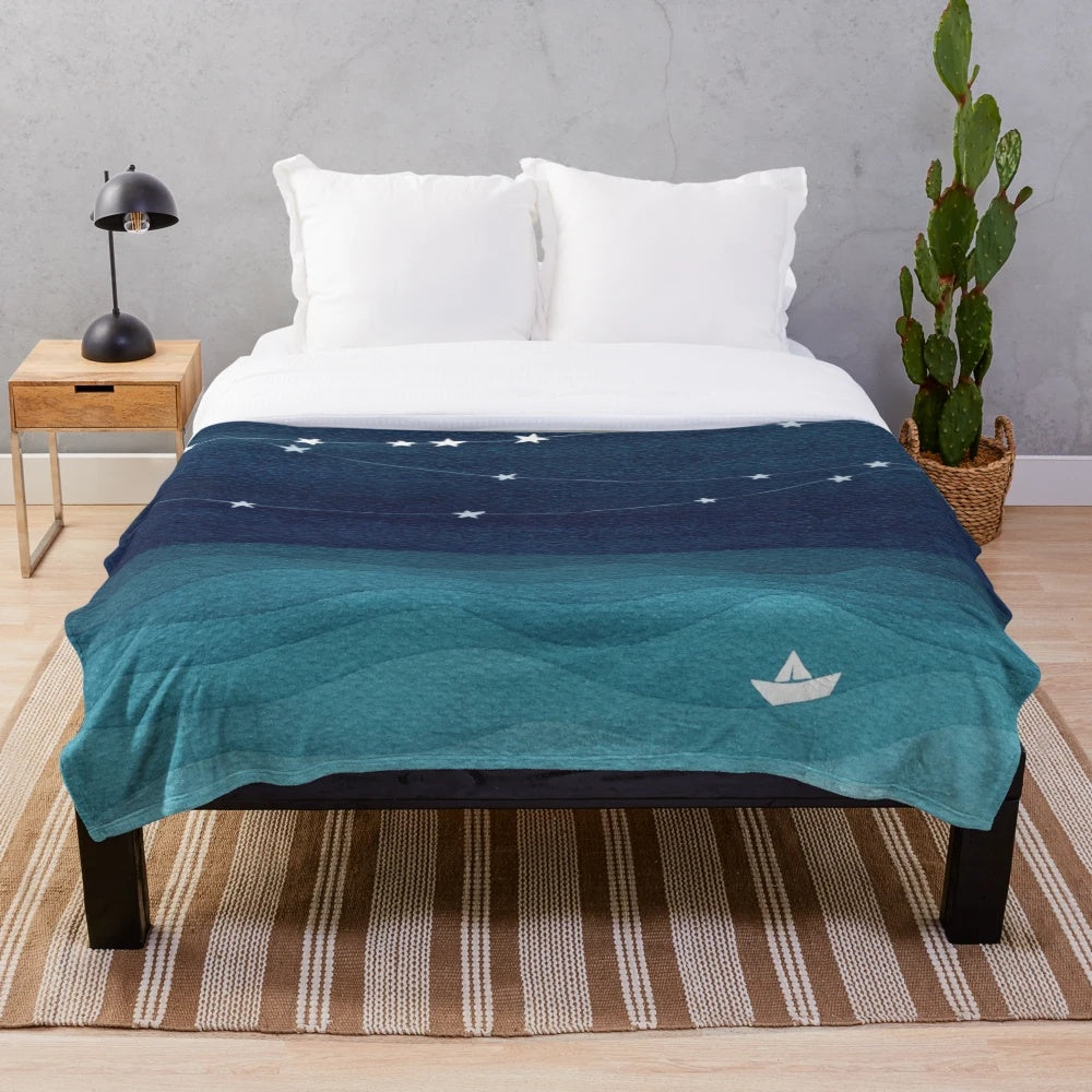 Teal ocean plush blanket with a watercolor garland of stars