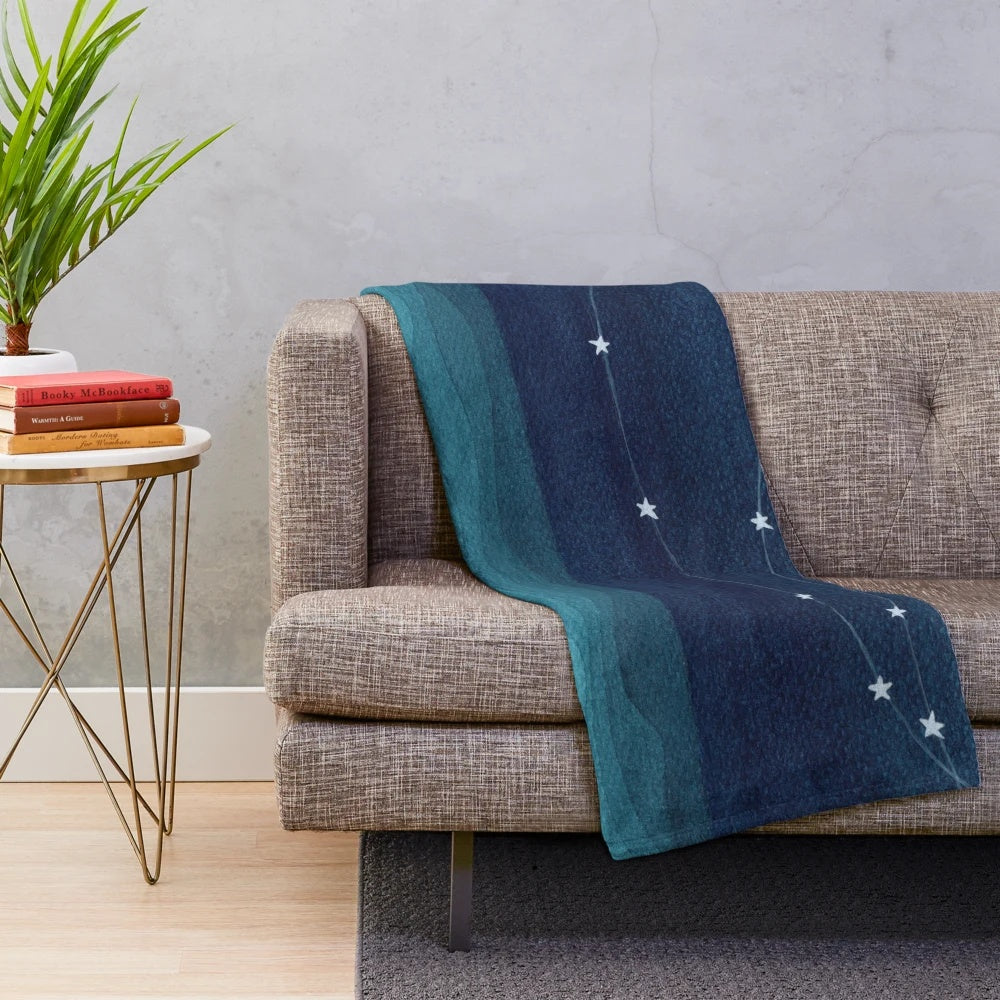 Teal ocean plush blanket with a watercolor garland of stars