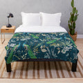 Soft, plush teal blanket with a beautiful peacock and floral chinoiserie pattern