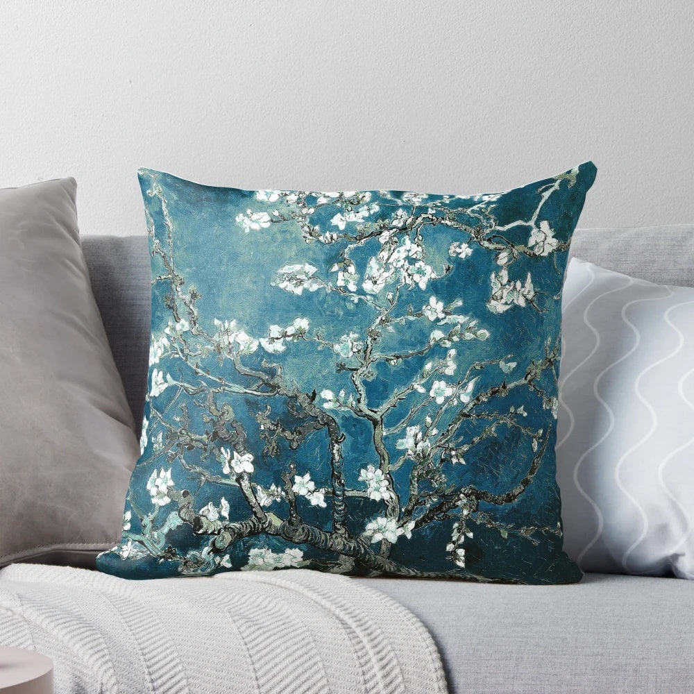 Teal pillow featuring the iconic Van Gogh Almond Blossoms impressionist floral design