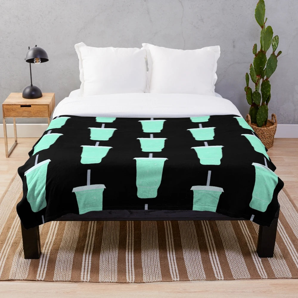 Teal plush blanket with Baja Blast soda inspired design
