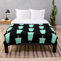 Teal plush blanket with Baja Blast soda inspired design