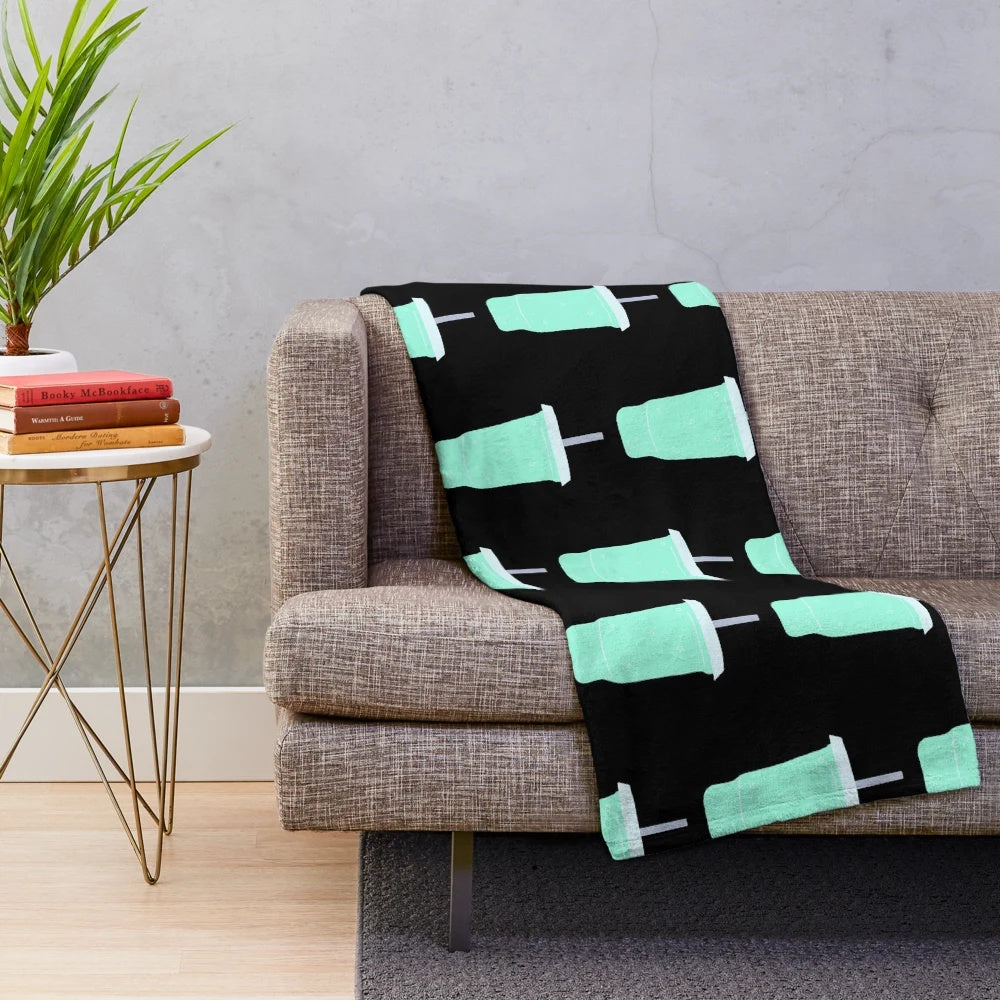 Teal plush blanket with Baja Blast soda inspired design