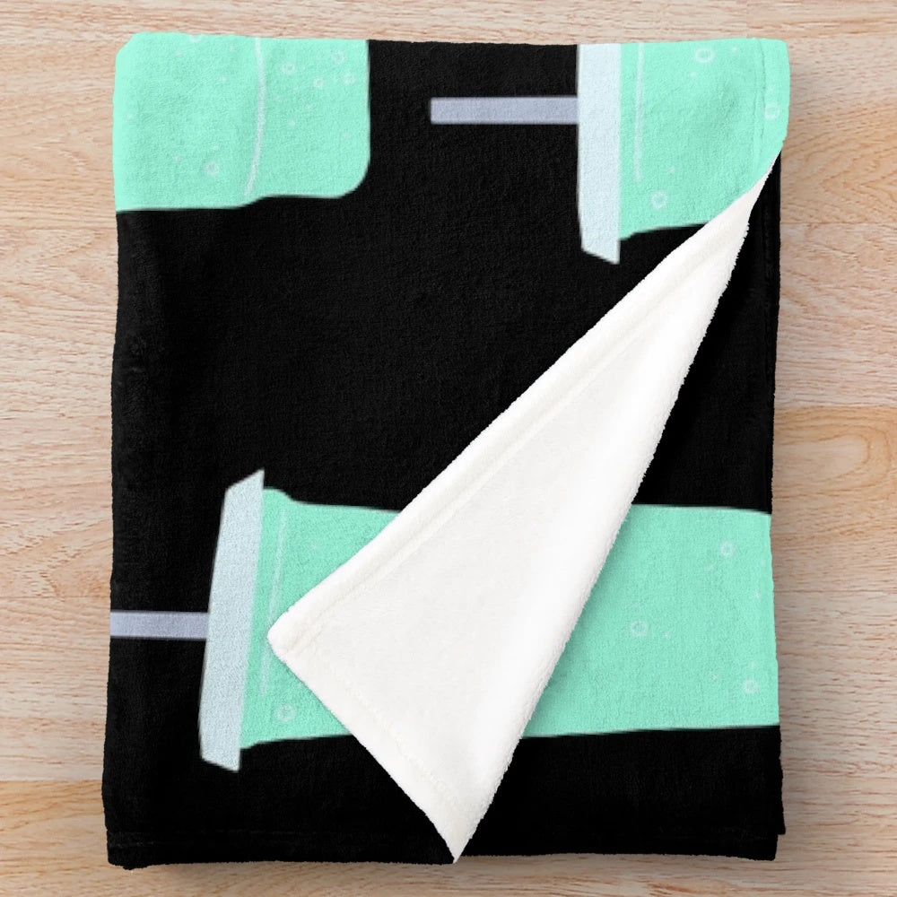 Teal plush blanket with Baja Blast soda inspired design