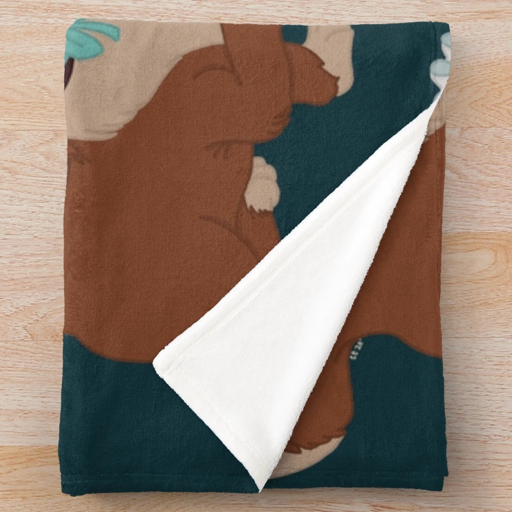 Teal plush blanket featuring the character Nana from the animated movie