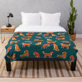 Teal plush blanket with abstract Nova Scotia duck tolling retriever silhouette