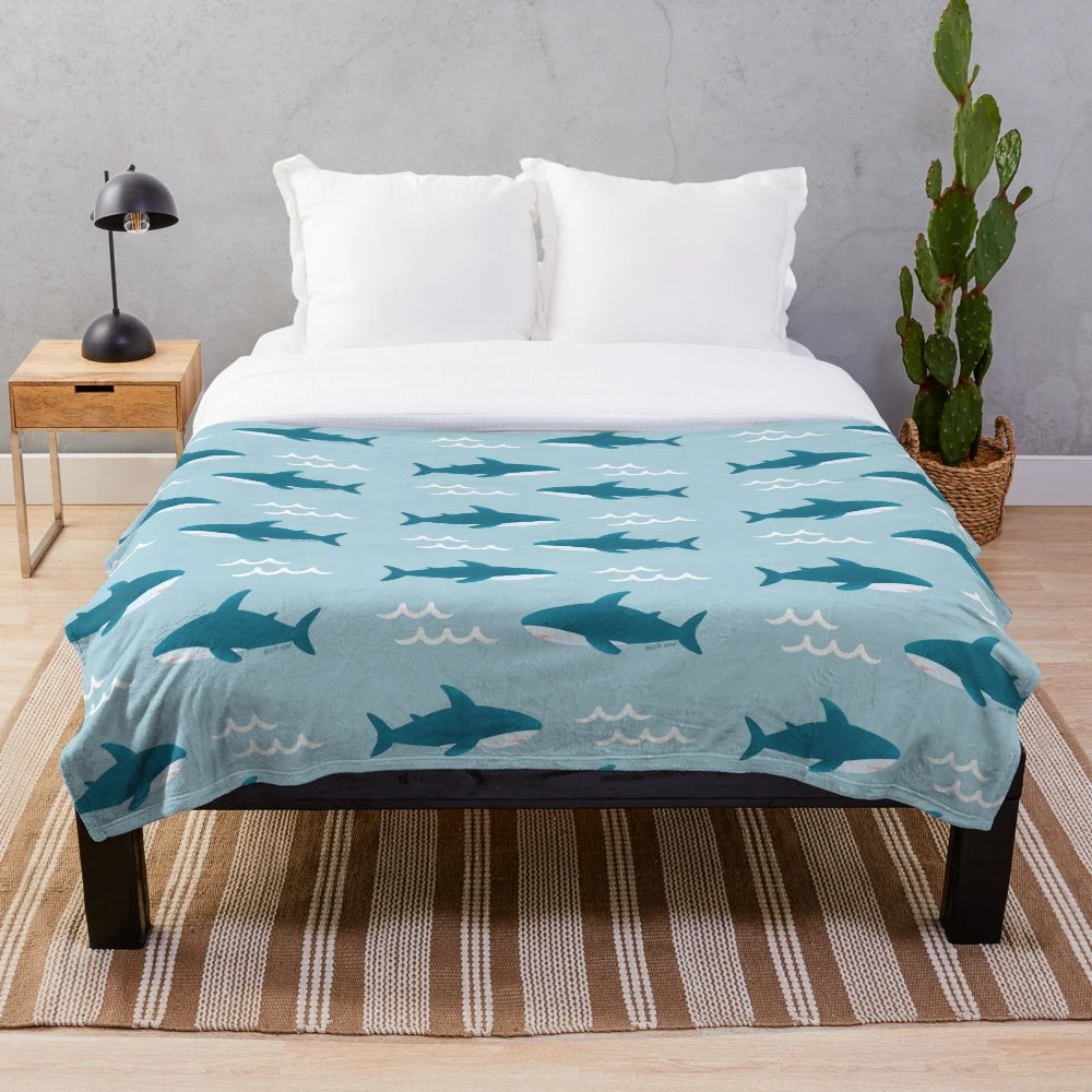 Teal shark-themed plush blanket with Blahaj-inspired design