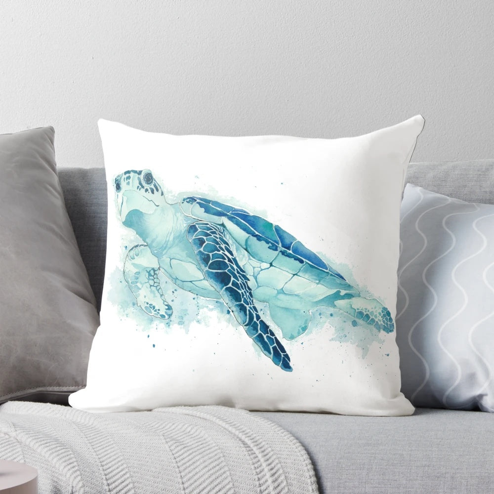 Vibrant watercolor painting of a sea turtle printed on a teal blue throw pillow for coastal home decor.