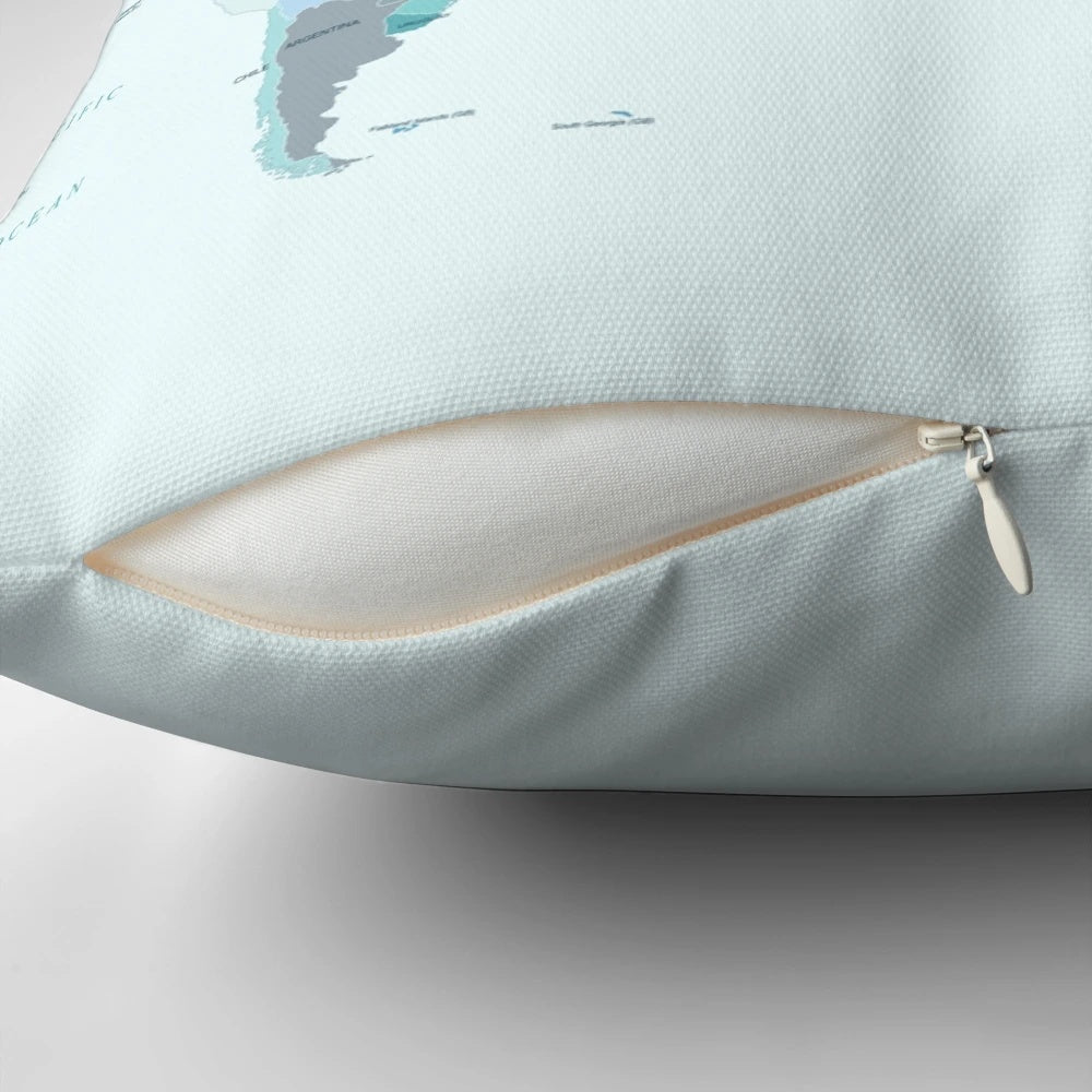 Teal and mint green world map printed on a soft, plush pillow for your home, office or dorm room.