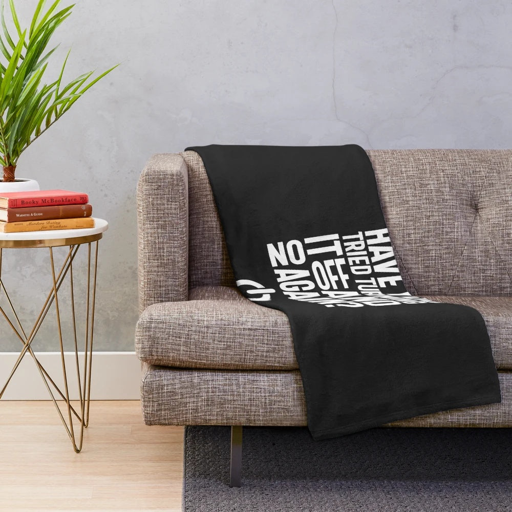 Cozy plush blanket with "Have You Tried Turning It On and Off Again?" text, perfect for tech support professionals