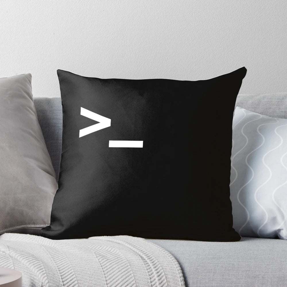 A black and white pillow with a terminal icon design, ideal for tech enthusiasts and programmers.