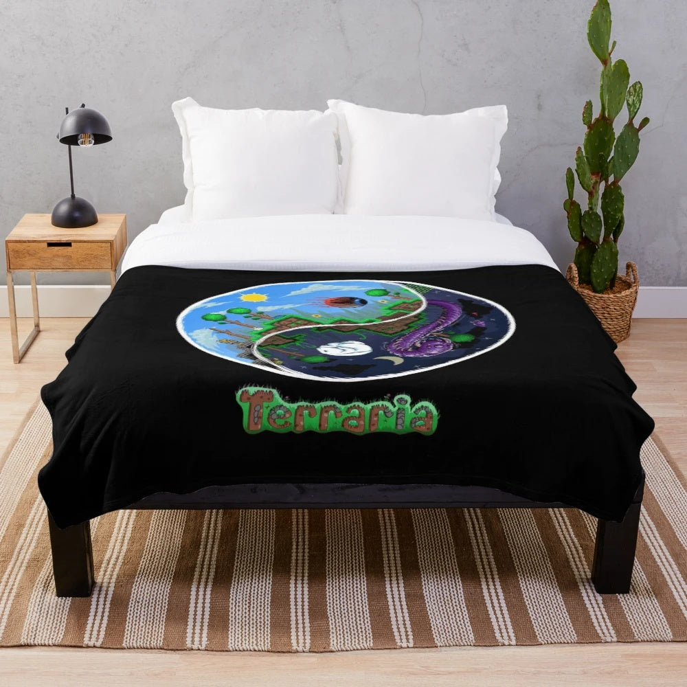 Terraria-inspired plush blanket featuring night and day horror design