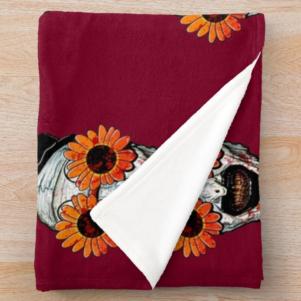 Terrifying Art the Clown from Terrifier 2 on a plush sunflower sunglasses blanket