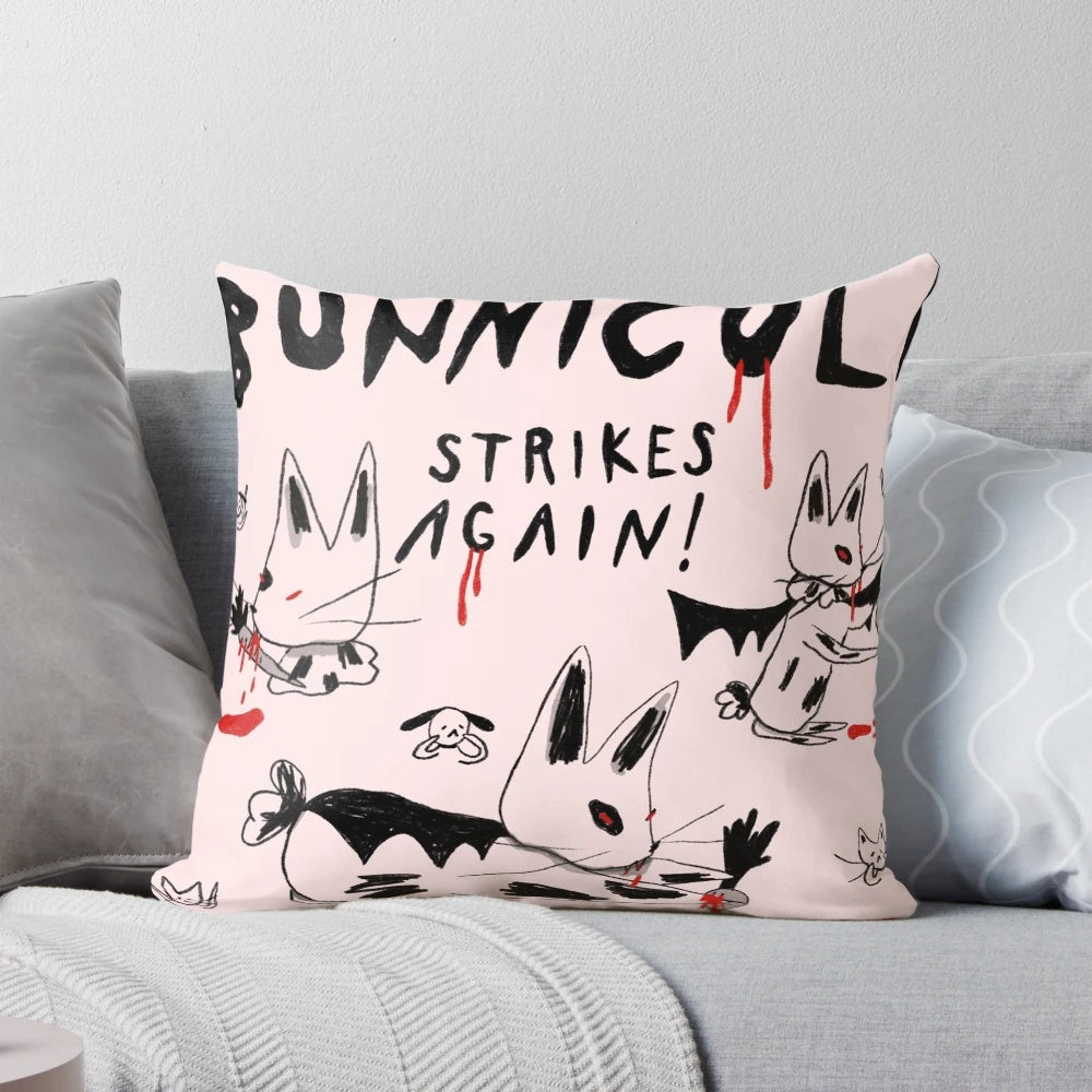 Bunnicula Strikes Again! Pillow featuring a spooky vampire rabbit design