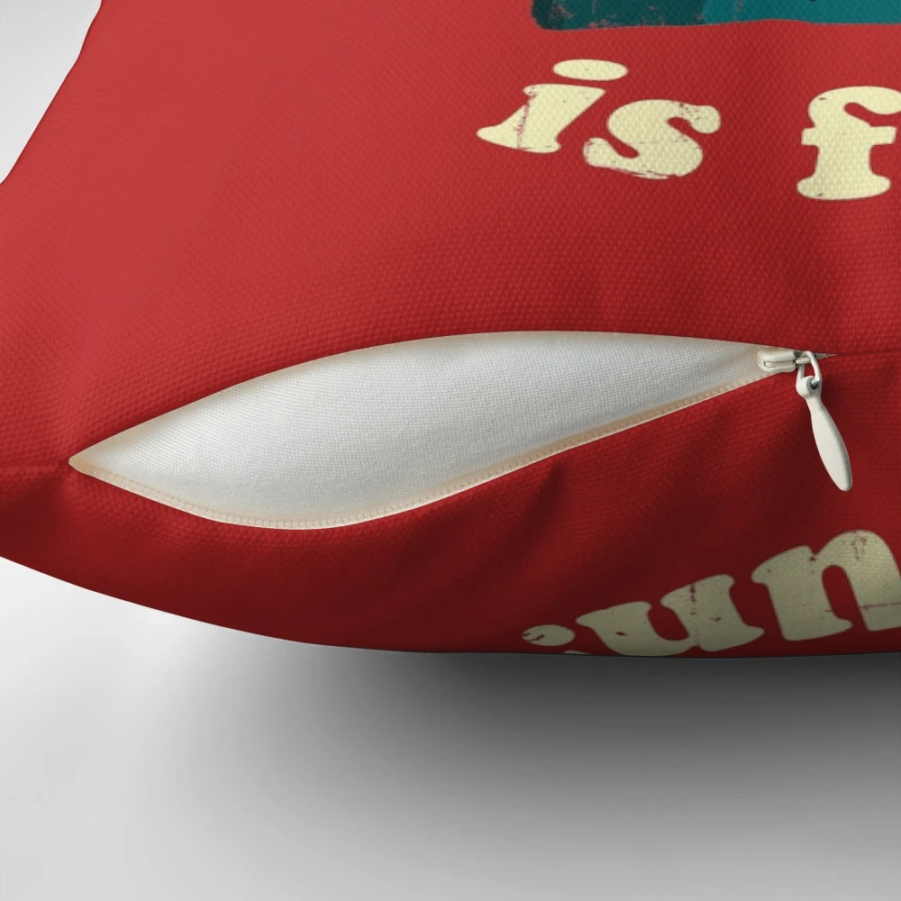 A reading pillow with a spooky, horror-themed design featuring references to the Evil Dead franchise.