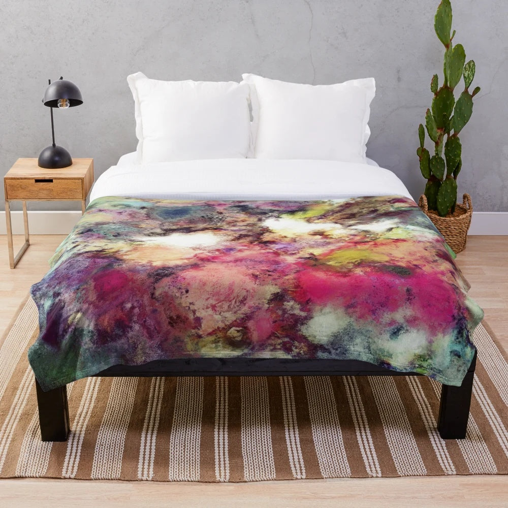 Textural abstract plush blanket featuring rocky, natural formations