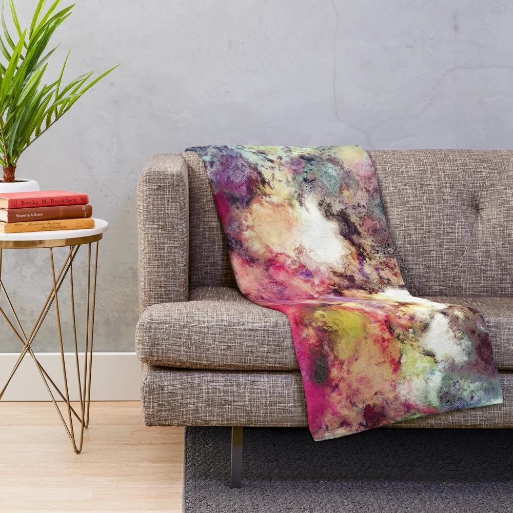 Textural abstract plush blanket featuring rocky, natural formations
