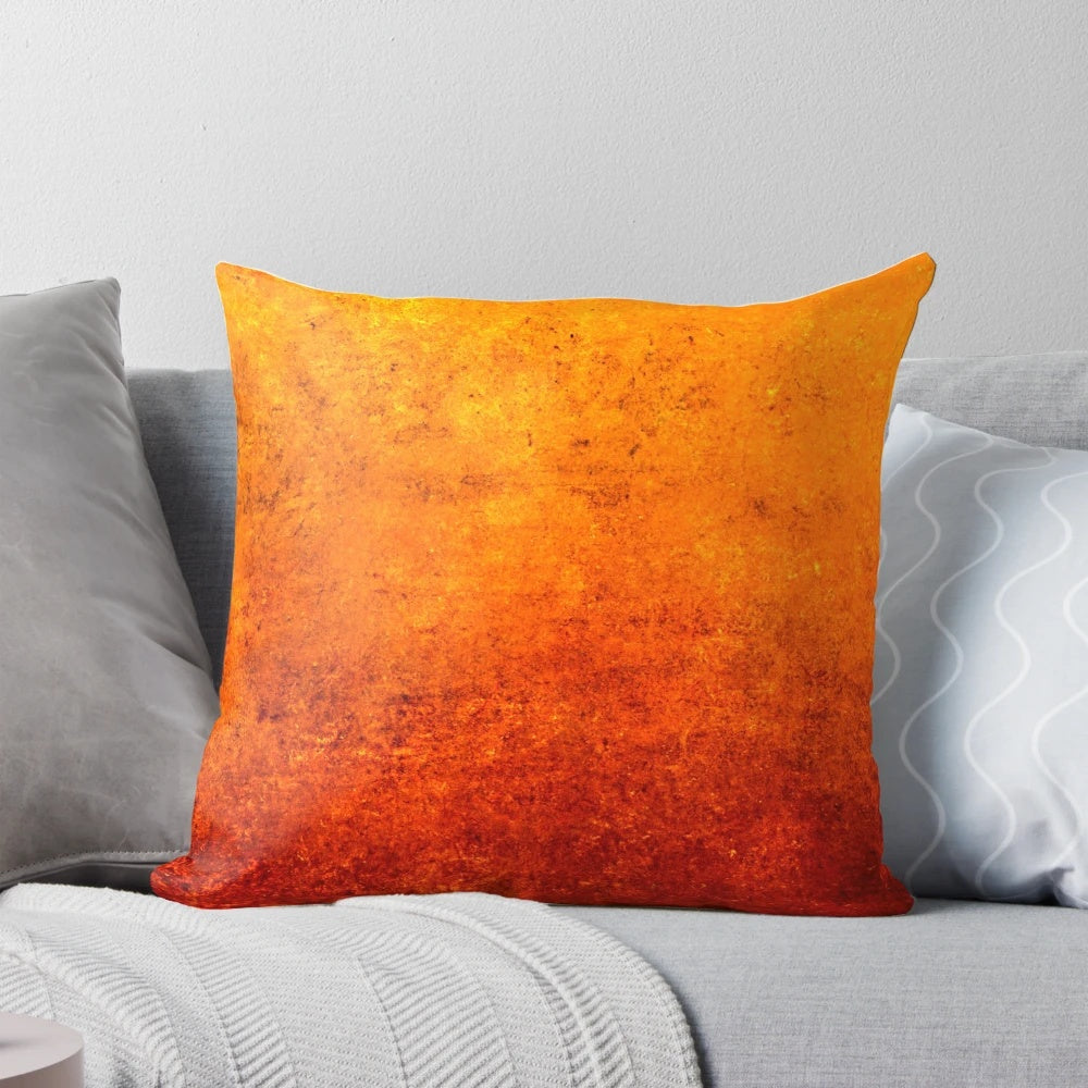 A textured abstract industrial art pillow with dark red and orange colors