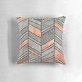 Chevron patterned throw pillow with concrete and copper textures