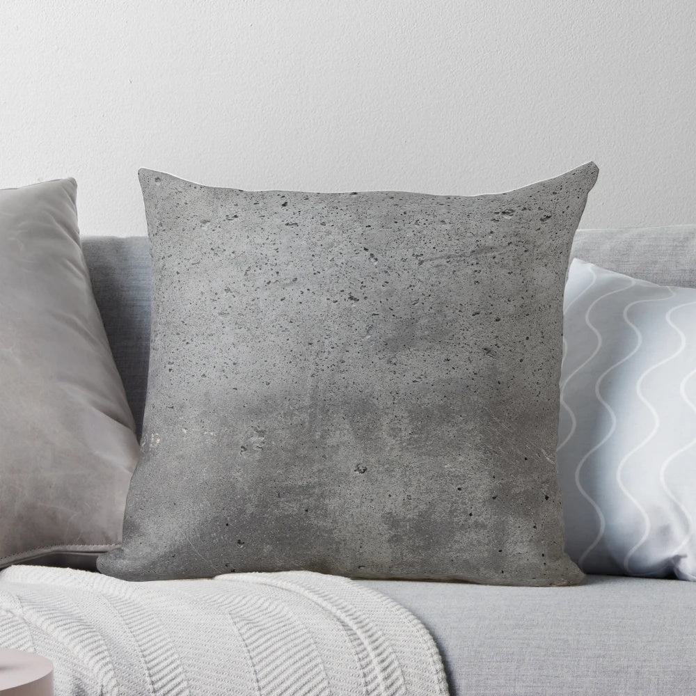Textured grey concrete wall design pillow