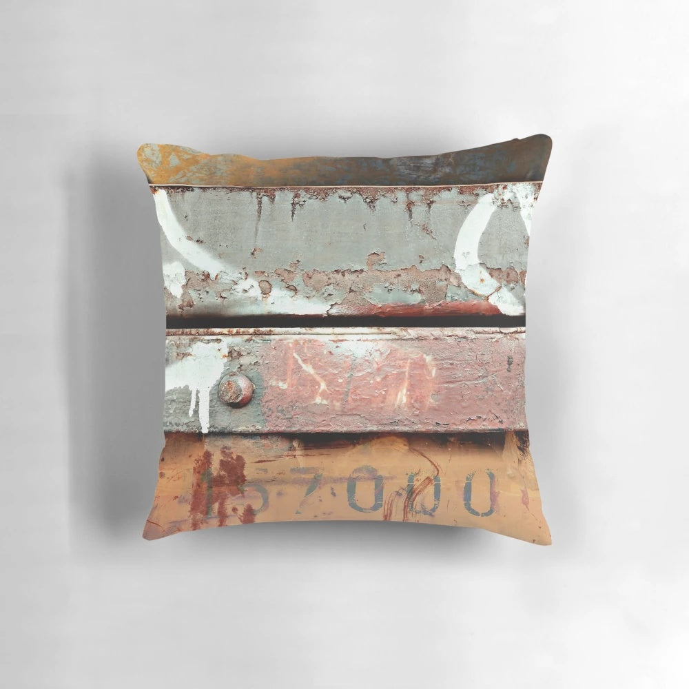 Industrial grunge-style pillow with a distressed, textured design inspired by urban art and architecture