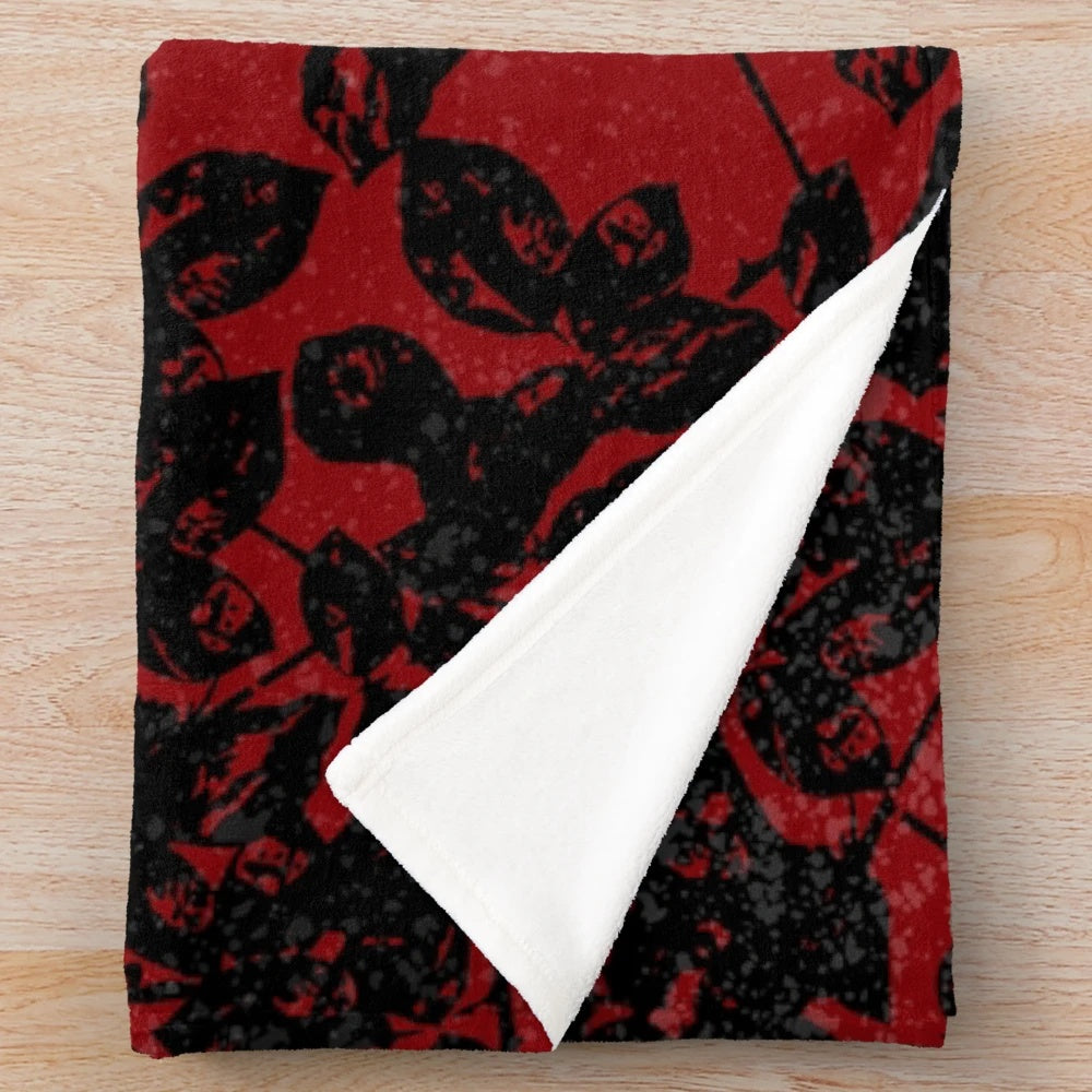 Textured plush blanket in black and red colors, inspired by Depeche Mode's Violator album