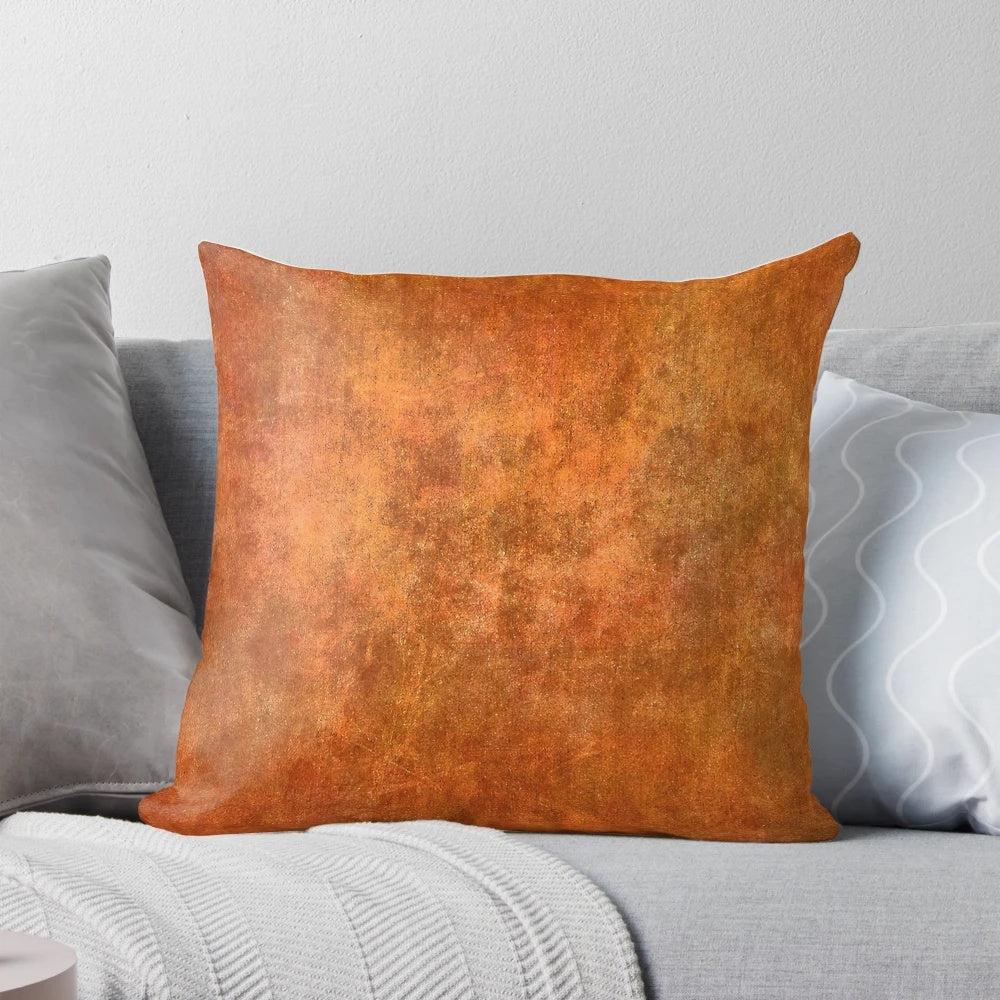 Textured rust and stone pillow with a rugged surface texture
