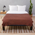 Soft, textured plush blanket with American football design