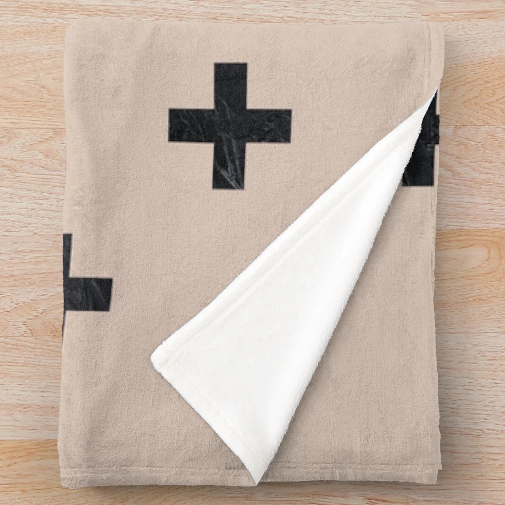 Beige and black textured swiss cross pattern plush blanket