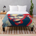 Cozy and soft plush blanket with a wood grain pattern design