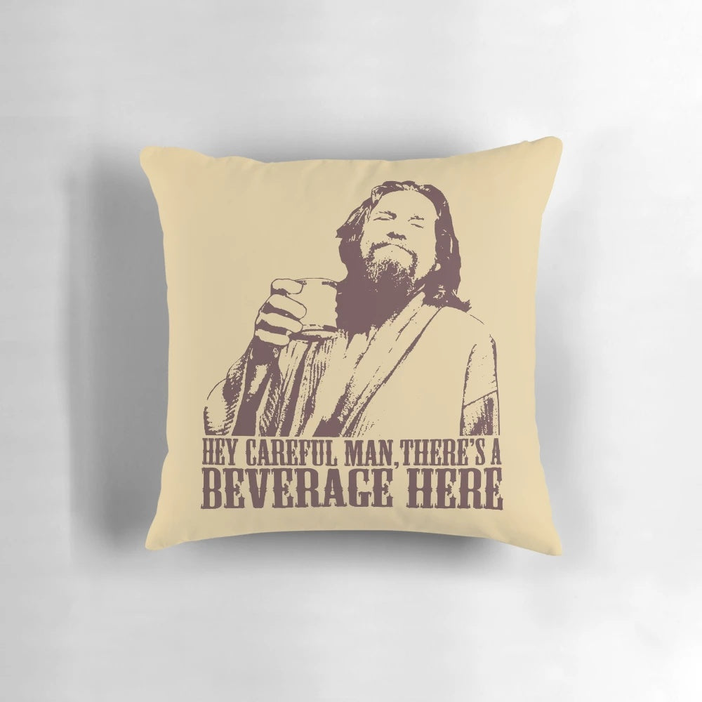 The Big Lebowski themed t-shirt pillow with the iconic "careful man, there's a beverage here" quote