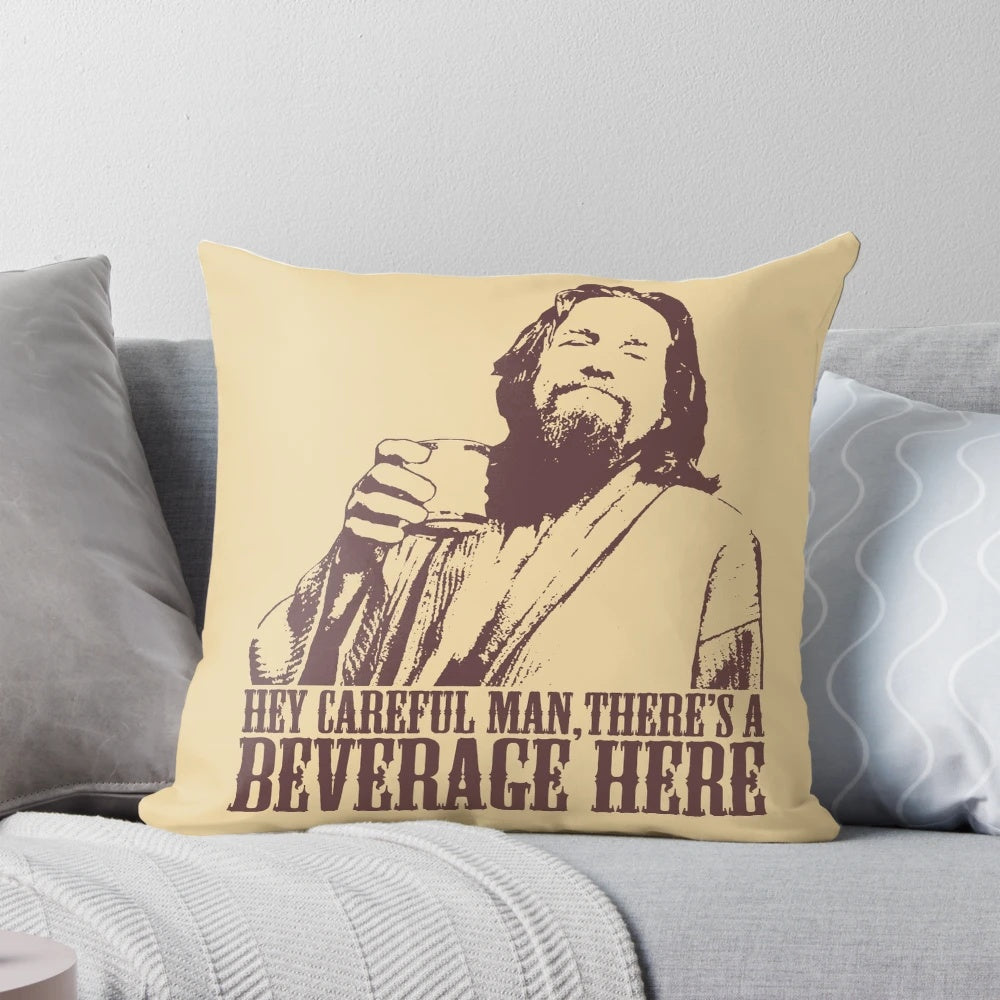 The Big Lebowski themed t-shirt pillow with the iconic "careful man, there's a beverage here" quote