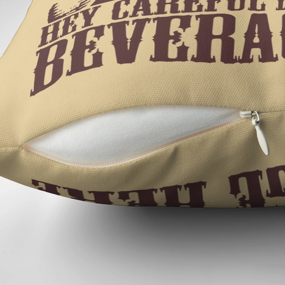 The Big Lebowski themed t-shirt pillow with the iconic "careful man, there's a beverage here" quote