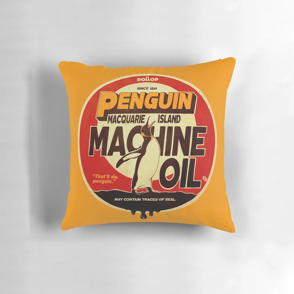 The Dollop Podcast Penguin Oil Pillow, a soft and plush home decor item featuring the logo and branding of the popular comedy history podcast.