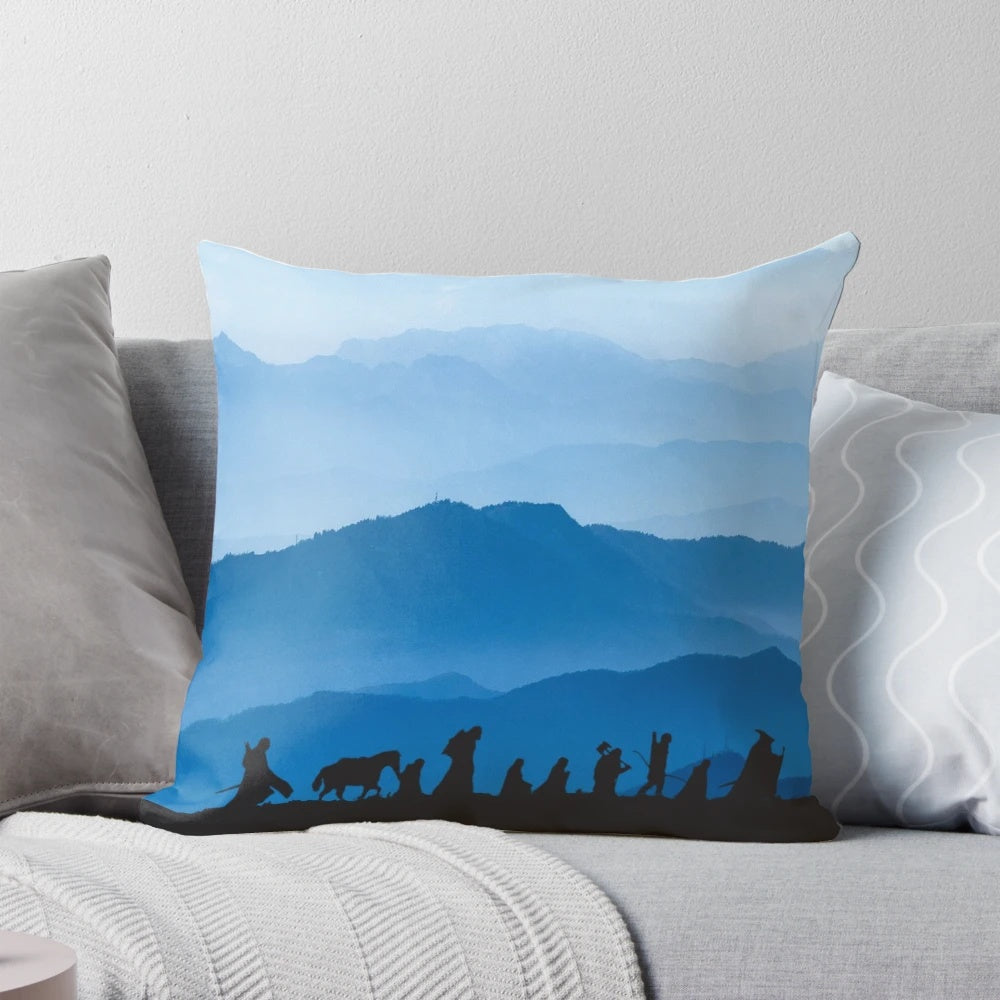 A cozy pillow featuring imagery and designs inspired by the Lord of the Rings and The Hobbit by J.R.R. Tolkien.