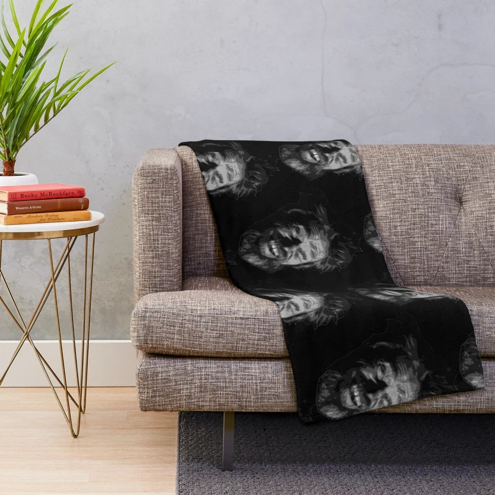The Lighthouse inspired plush blanket featuring Willem Dafoe's character design