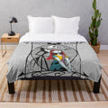 Plush blanket featuring Jack Skellington and Sally from The Nightmare Before Christmas