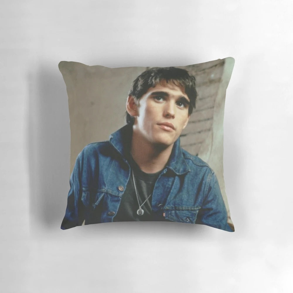 A plush and cozy pillow featuring the iconic character Dally Winston from the classic 80s film The Outsiders