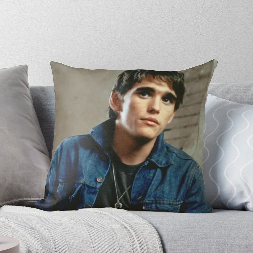 A plush and cozy pillow featuring the iconic character Dally Winston from the classic 80s film The Outsiders