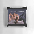 A plush pillow featuring a stylized image of Dwayne "The Rock" Johnson, the popular movie star and champion.