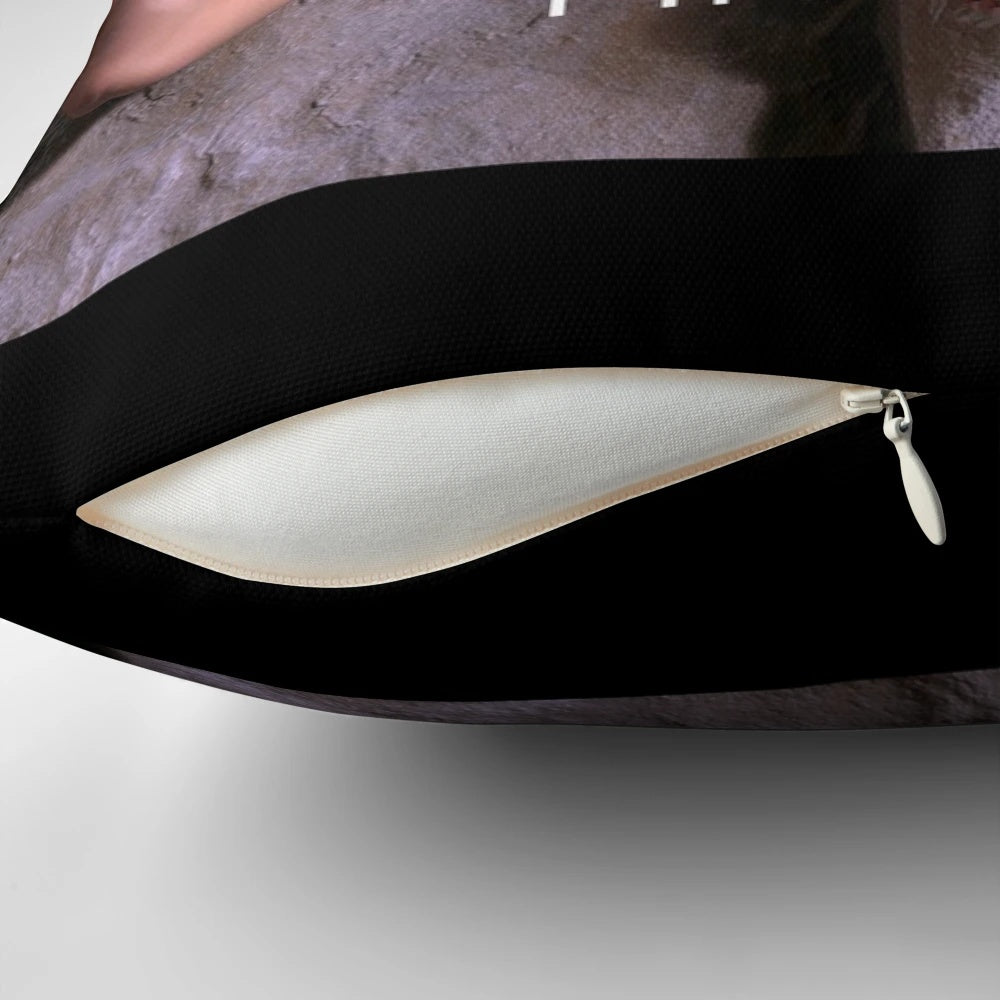 A plush pillow featuring a stylized image of Dwayne "The Rock" Johnson, the popular movie star and champion.