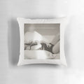A stylish and comfortable pillow featuring the album cover art of Taylor Swift's "The Tortured Poets Department" release.