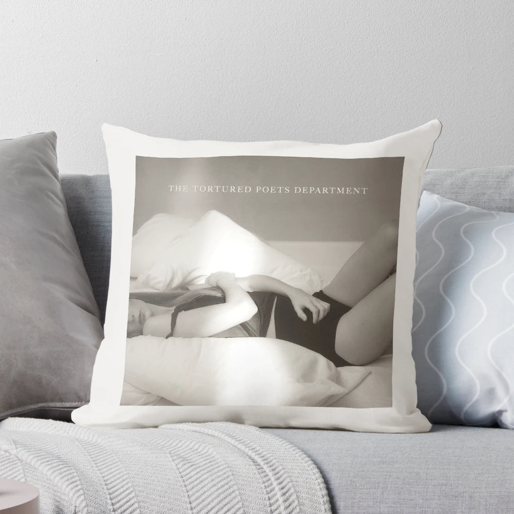 A stylish and comfortable pillow featuring the album cover art of Taylor Swift's "The Tortured Poets Department" release.