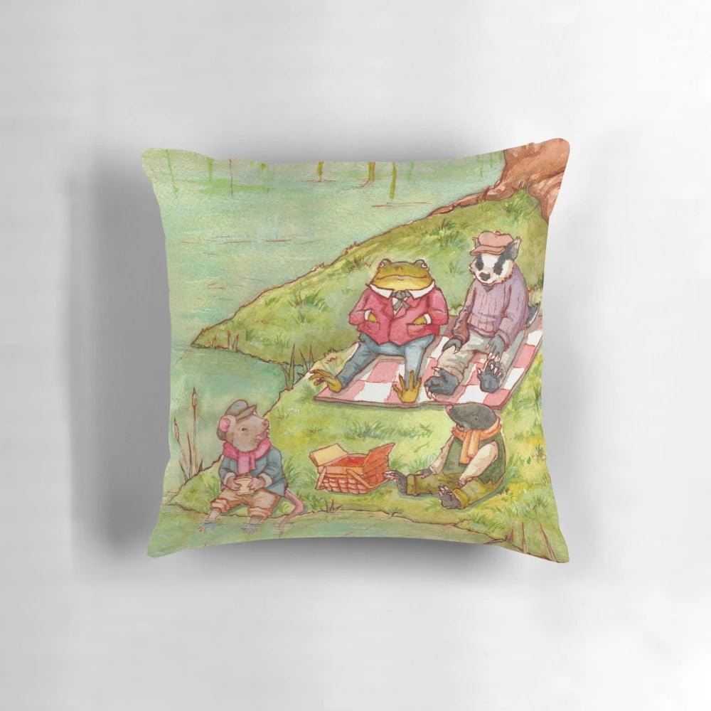 Decorative pillow featuring a watercolor illustration of characters from the classic children's book "The Wind in the Willows" by Kenneth Grahame.