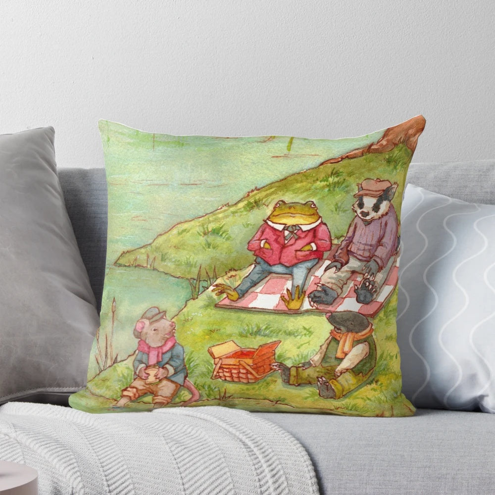 Decorative pillow featuring a watercolor illustration of characters from the classic children's book "The Wind in the Willows" by Kenneth Grahame.